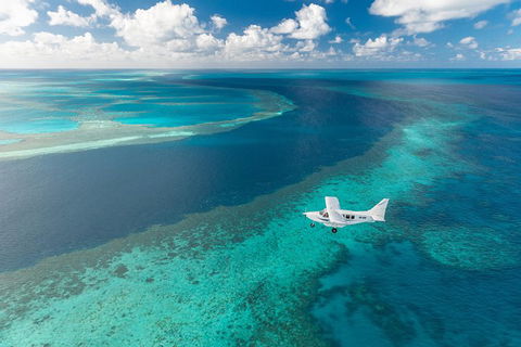 Great Barrier Reef Scenic Flight And Ocean Rafting Whitehaven Beach Day Trip - Accommodation Perth 3